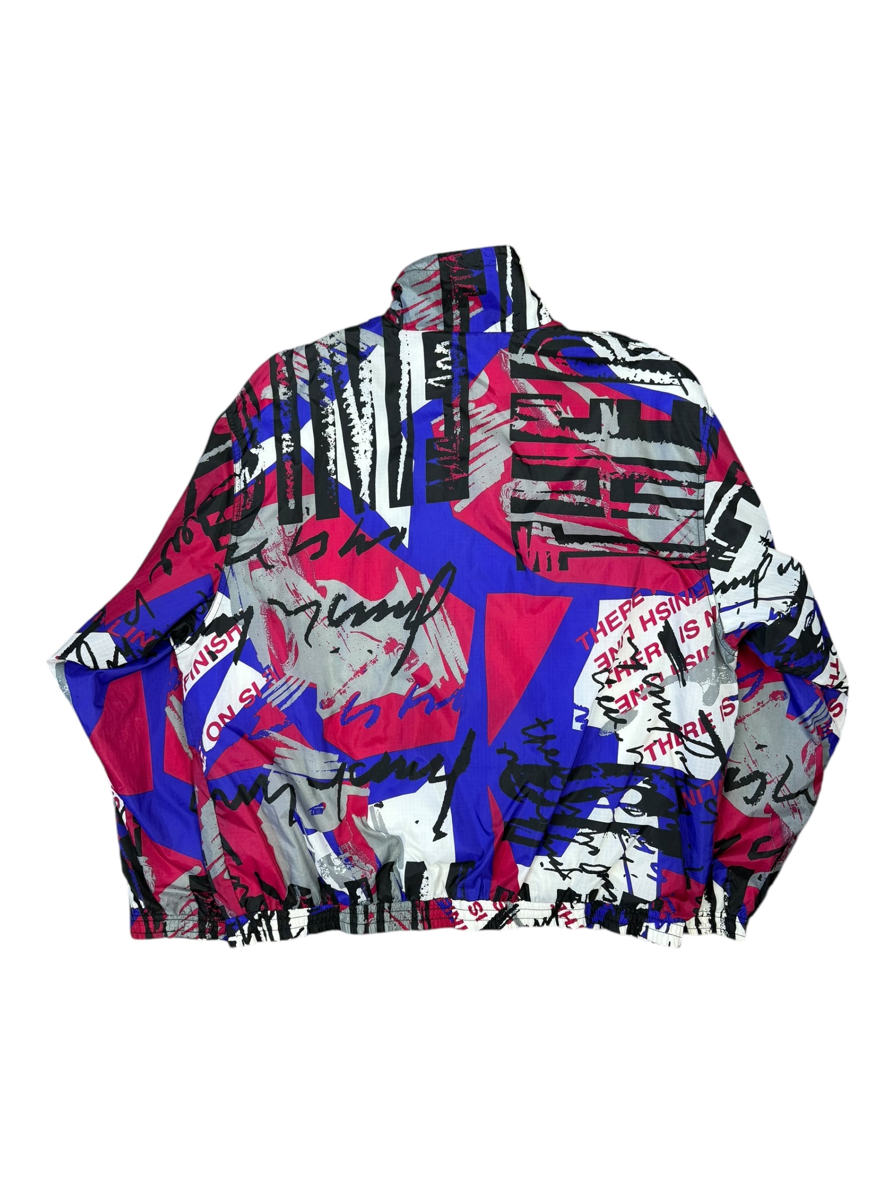 NIKE 90s Shell Windbreaker “There is No Finish Line" Adult XL AOP Grey Tag